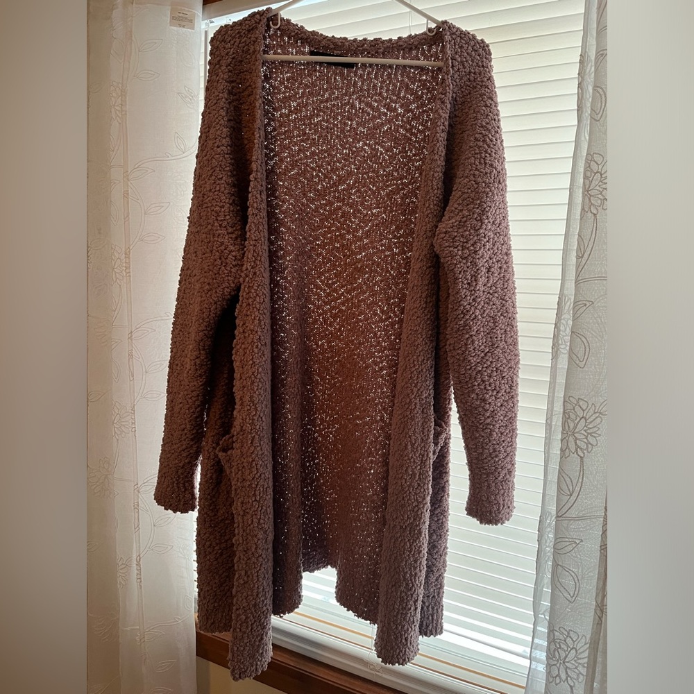 Long, mauve sweater
